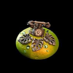 "JUNGLE CALL" HAND PAINTED ROCK WITH MINIATURE VINTAGE TELEPHONE AND LEAVES